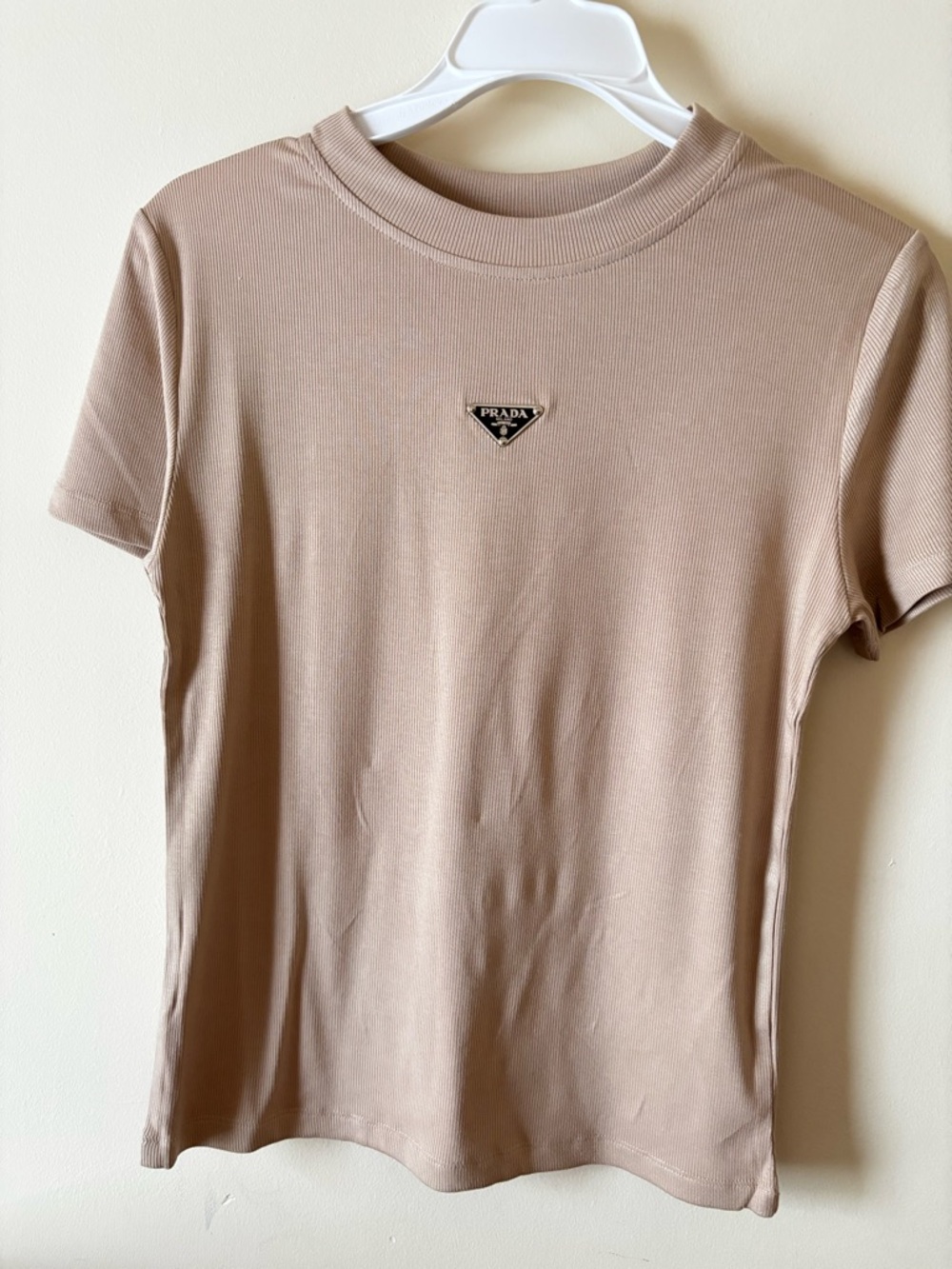 Black Triangle Logo Patch on Beige Textile one size